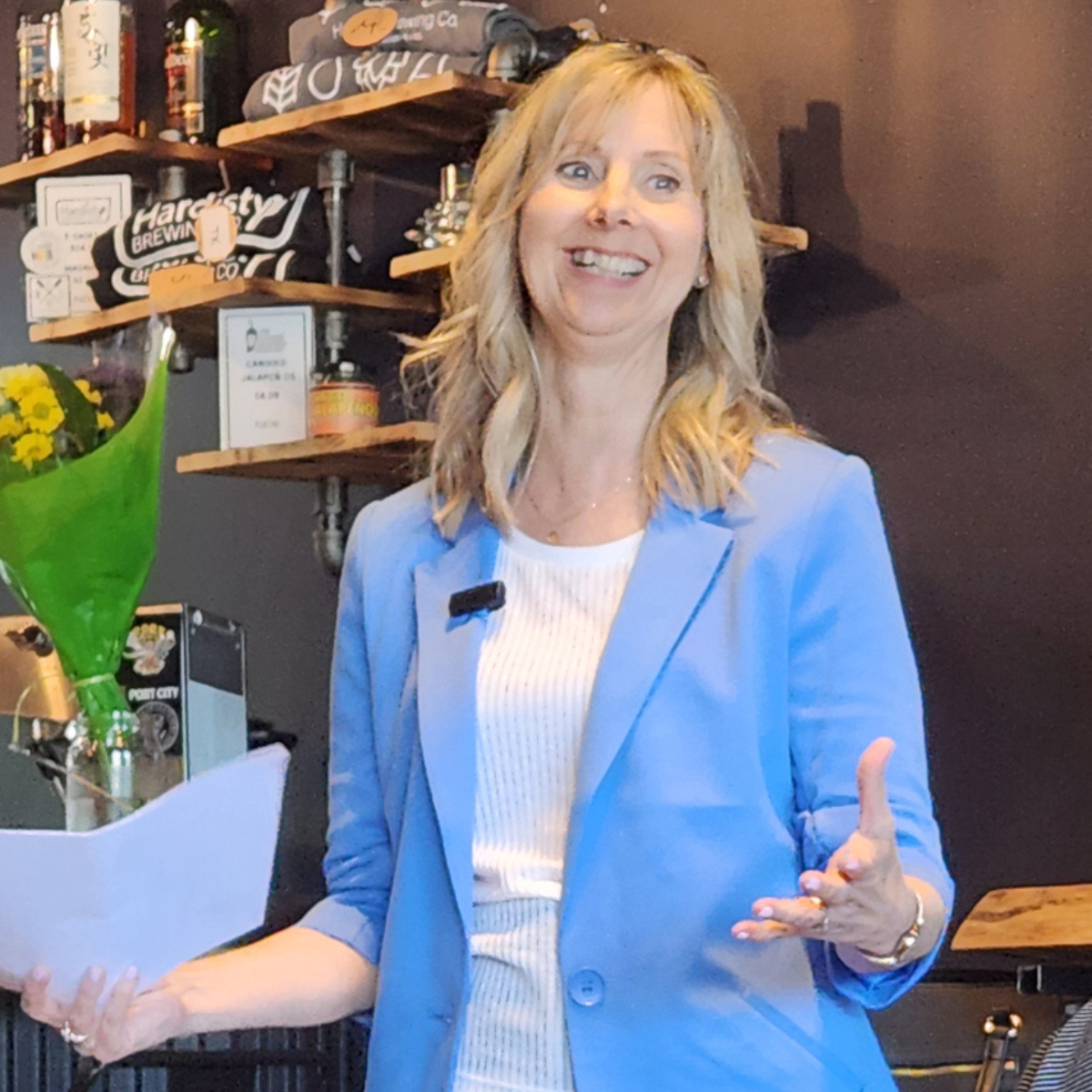 Nicole Gallant speaking at her 10 yr business anniversary celebration, thanking her colleagues and clients.