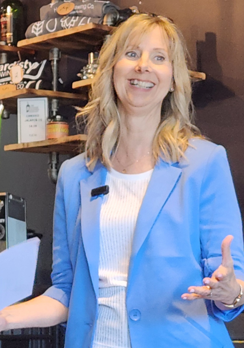 Nicole Gallant speaking at her 10 yr business anniversary celebration, thanking her colleagues and clients.